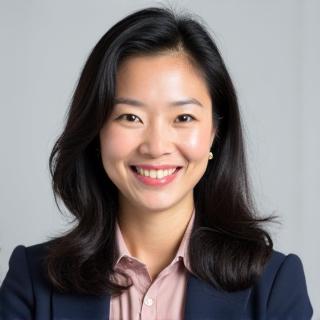 Professional headshot of Sarah Chen, a friendly-looking woman in her 40s.